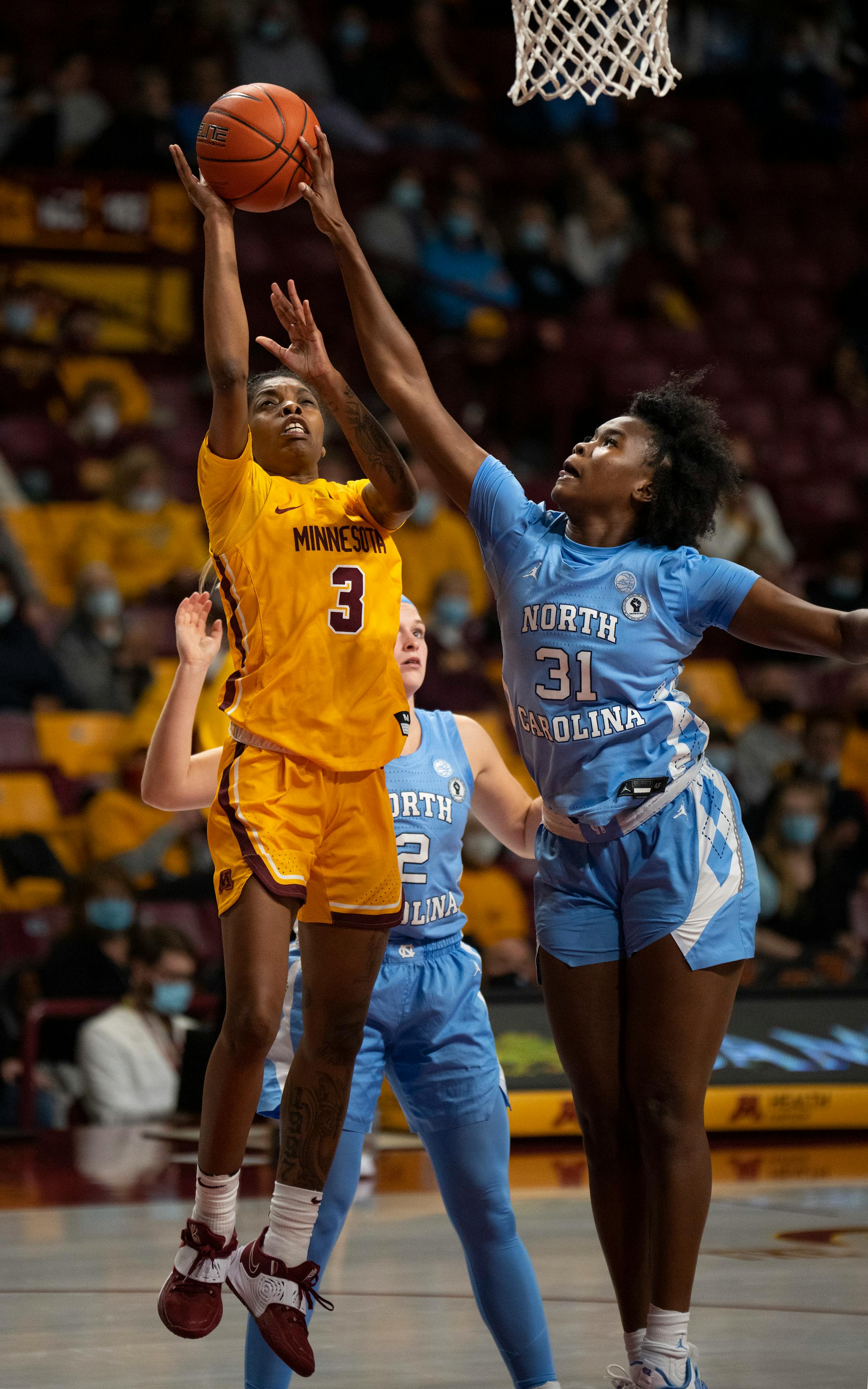 Minnesota Gophers guard Deja Winters (3) had her third quarter shot swatted away by North Carolina Tar Heels forward Anya Poole (31) Wednesday, Dec. 1, 2021 at Williams Arena in Minneapolis. She scored 17 points in the game. The University of Minnesota women's basketball team lost to the University of North Carolina 82-76 in an NCAA basketball game Wednesday, Dec. 1, 2021 night at Williams Arena in Minneapolis. ] JEFF WHEELER • Jeff.Wheeler@startribune.com
