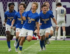 Tyler Baker (17) and his Wayzata teammates celebrated his overtime penalty kick that won Wednesday’s Class 3A semifinal.