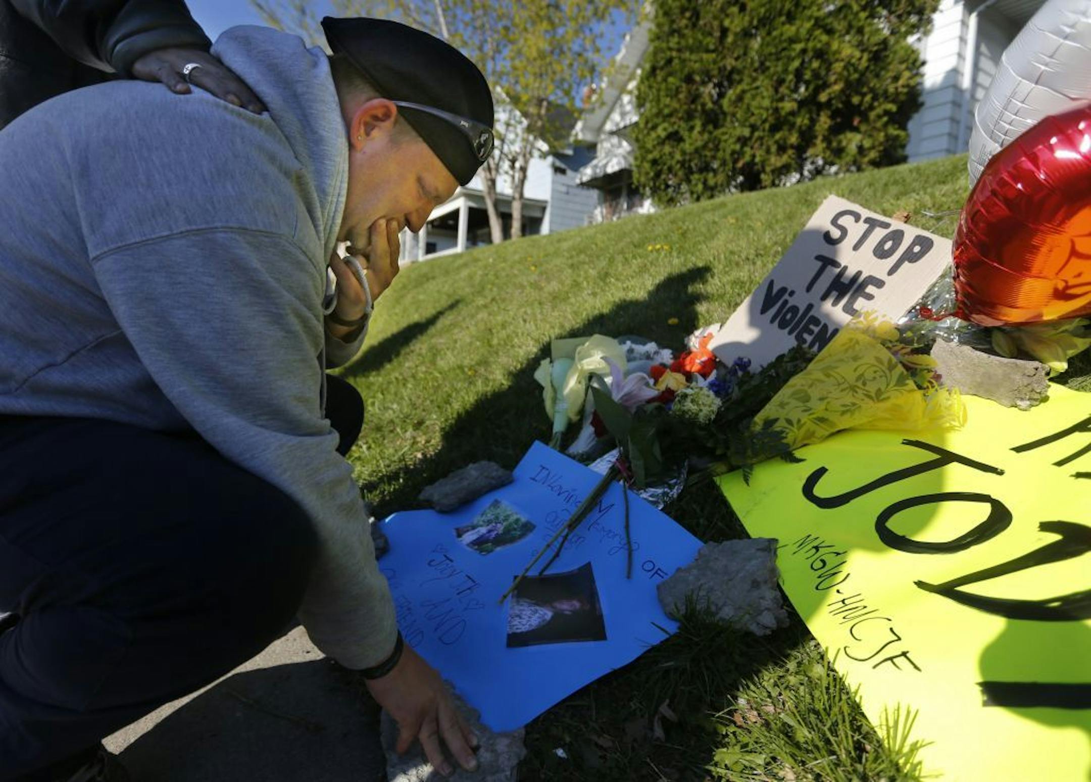 Jody Patzner Sr. grieved at the memorial erected near where his son, Jody Patzner Jr., was shot.