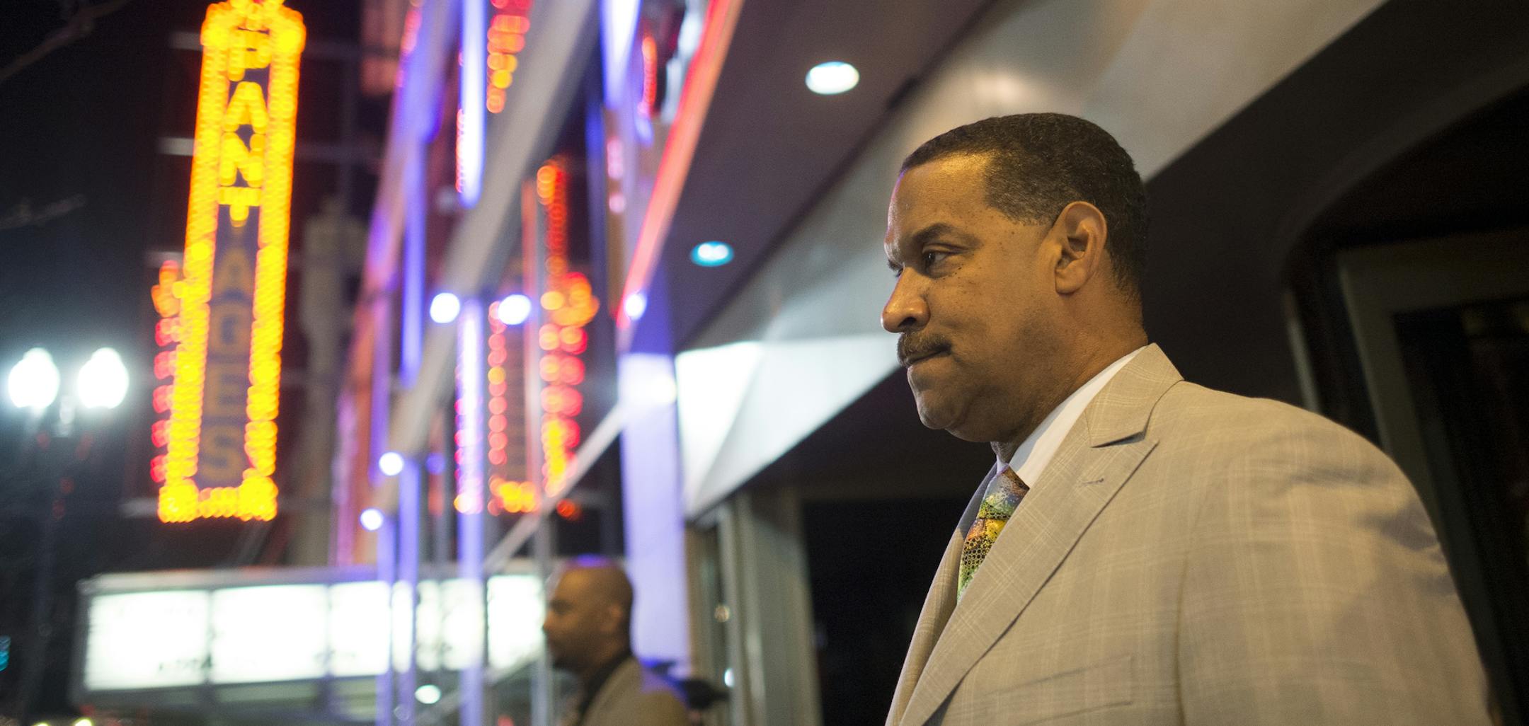 Bryant Webster, a doorman at Seven Steakhouse, looked on while waiting for customers on Saturday night. ] (Aaron Lavinsky | StarTribune) aaron.lavinsky@startribune.com We photograph a profile on Bryant Webster, a doorman at "Seven: Steakhouse, Sushi Ultralounge and Skybar" on Saturday, April 25, 2015 in downtown Minneapolis.