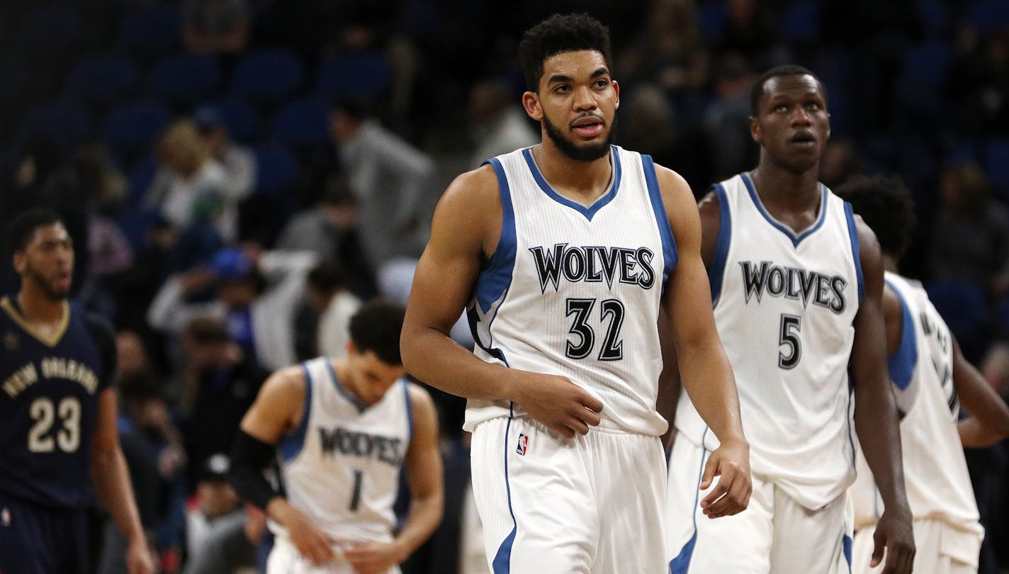 Minnesota Timberwolves players including center Karl-Anthony Towns (32), and forward Gorgui Dieng (5) leave the court after losing to the New Orleans Pelicans. ] ANTHONY SOUFFLE &#xef; anthony.souffle@startribune.com Game action from an NBA game between the Minnesota Timberwolves and the New Orleans Pelicans Friday, Feb. 10, 2017 at the Target Center in Minneapolis.