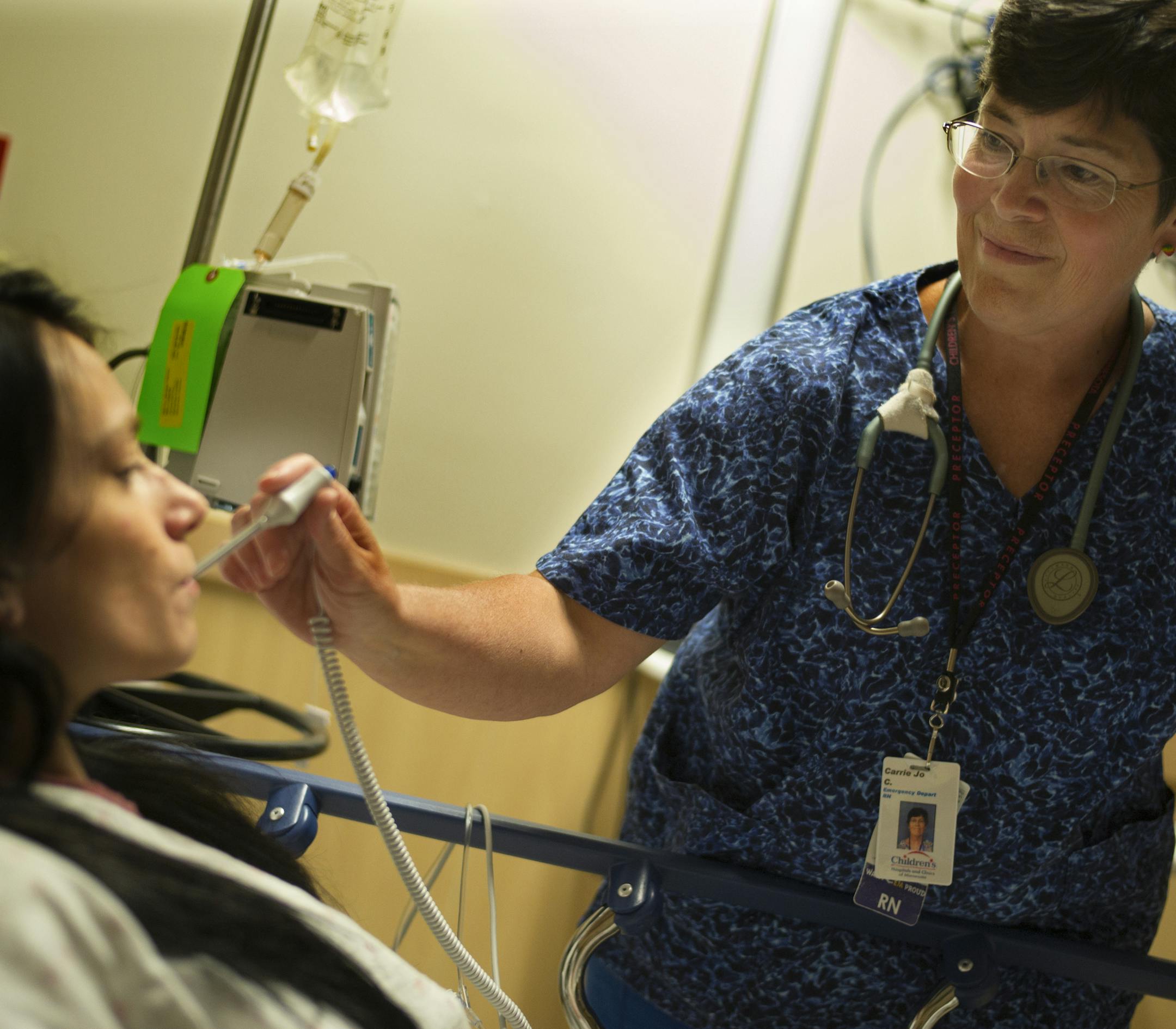 At Children's Hospital in St. Paul on August 14, 2014, pediatric nurse Carrie Jo Cain will travel to Sierra Leone to train medical workers and bring medical supplies to one of the three countries at the epicenter of the Ebola outbreak. Cain grew up there as a missionary's daughter in the West African nation. She said she knows the language and culture and can minimize the personal risk to herself. ] Richard Tsong-Taatarii/rtsong-taatarii@startribune.com