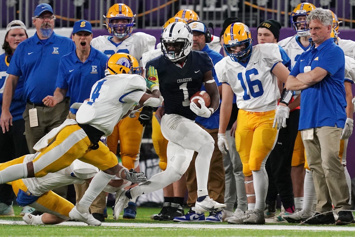 Dassel-Cokato's Eli Gillman (1) was forced out of bounds by Esko's Javontae Gregory (4) as he rushed the ball in the second half as Esko played Dassel-Cokato in a Class 3A semifinal football game Saturday, Nov. 20, 2021 at U.S. Bank Stadium in Minneapolis. ] ANTHONY SOUFFLE • anthony.souffle@startribune.com