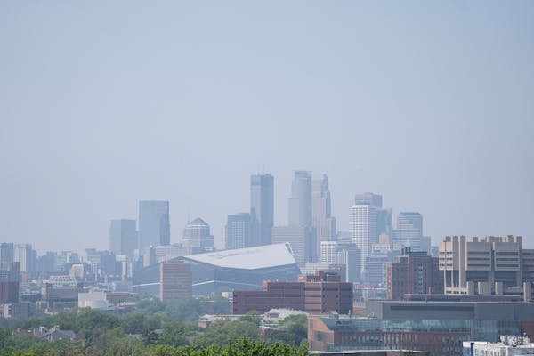 Smoke from Canadian wildfires lingers in the air over downtown Minneapolis on Monday, May 13, 2024.