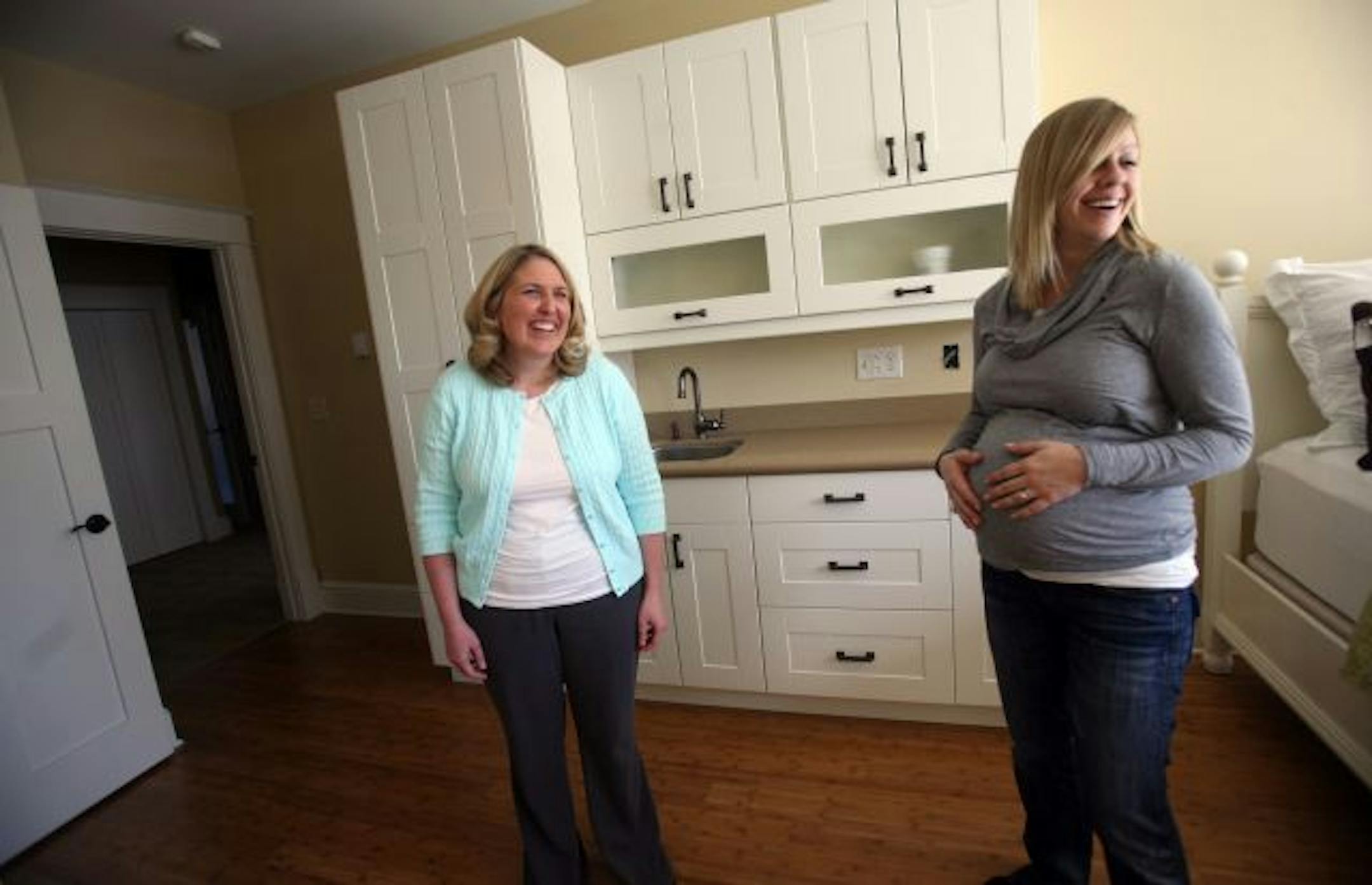Dr. Amy Johnson Grass showed soon to be mother Shayla Farmer, of Hopkins, one of the two birthing bedrooms at the Health Foundations.