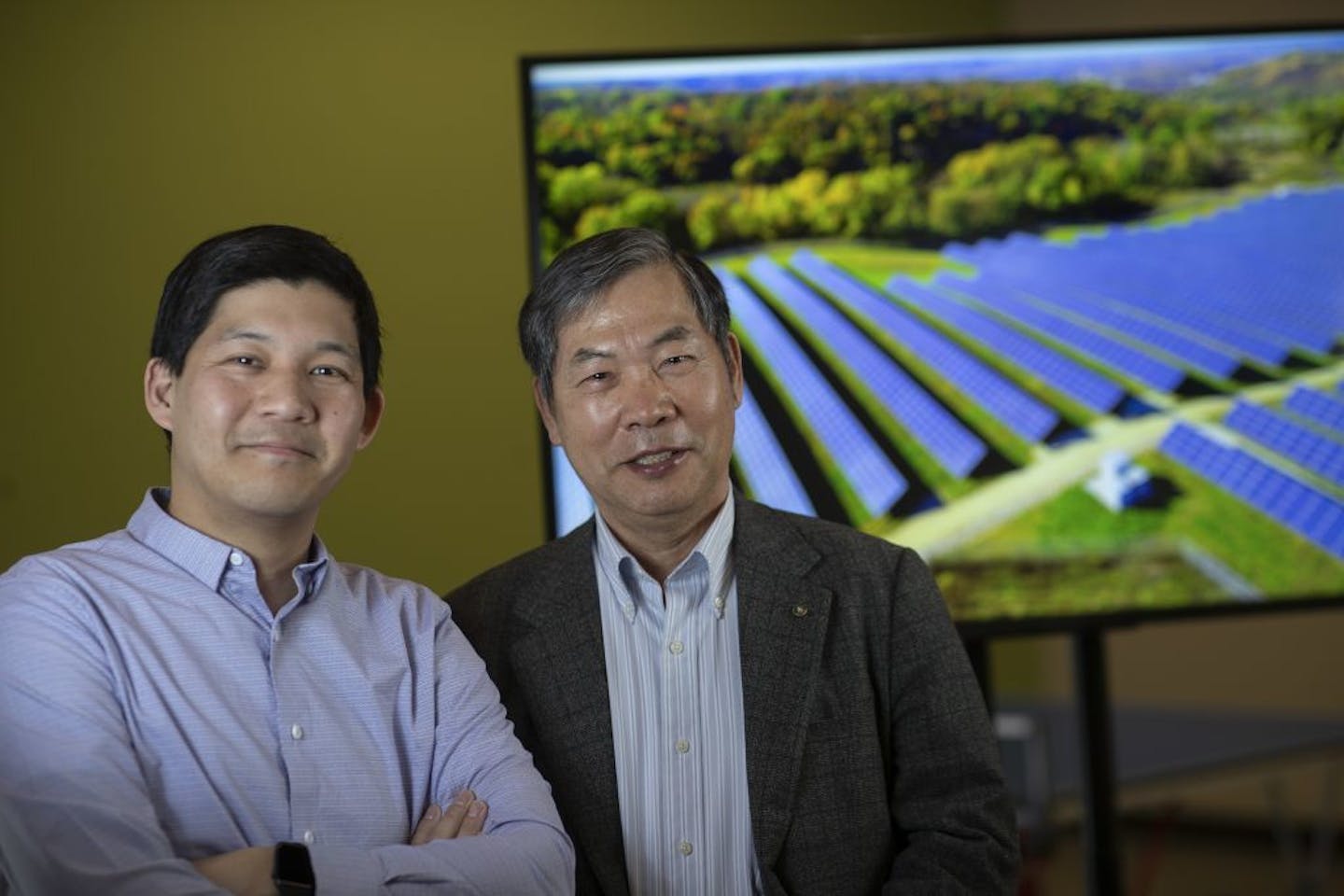 Portrait of Andy Kim left and his dad Dennis Kim at EVS .