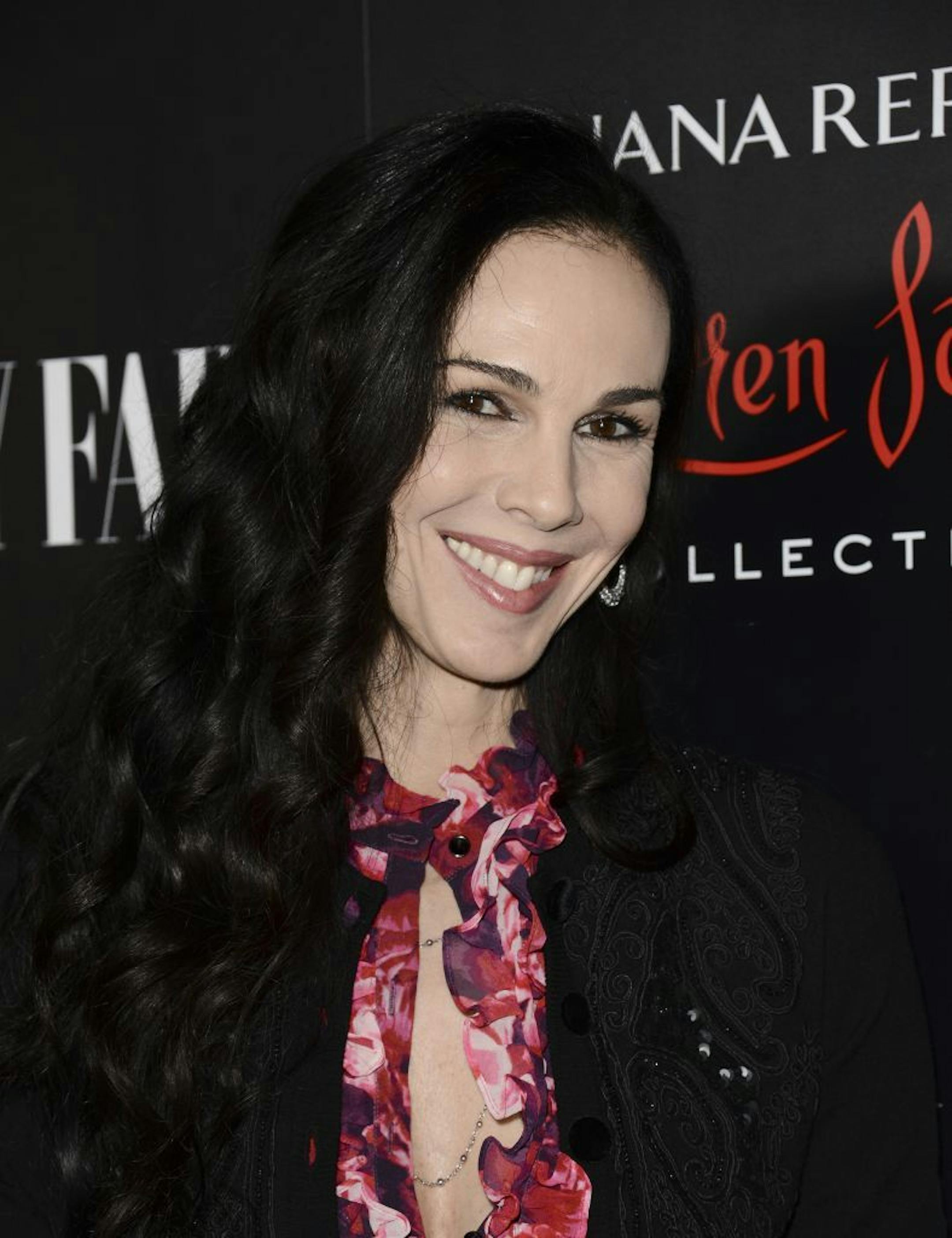 This Nov. 19, 2013 photo shows fashion designer L'Wren Scott at the Banana Republic L'Wren Scott Collection launch party at the Chateau Marmont in West Hollywood, Calif.