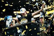 Iowa’s star player Caitlin Clark dances in the confetti after winning the Big Ten earlier this month at Target Center.