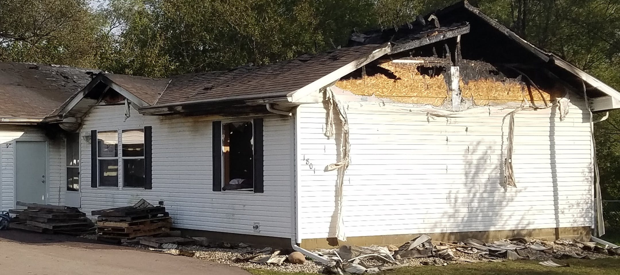 A couple and their young son were rescued from this burning home by a St. Peter police officer.