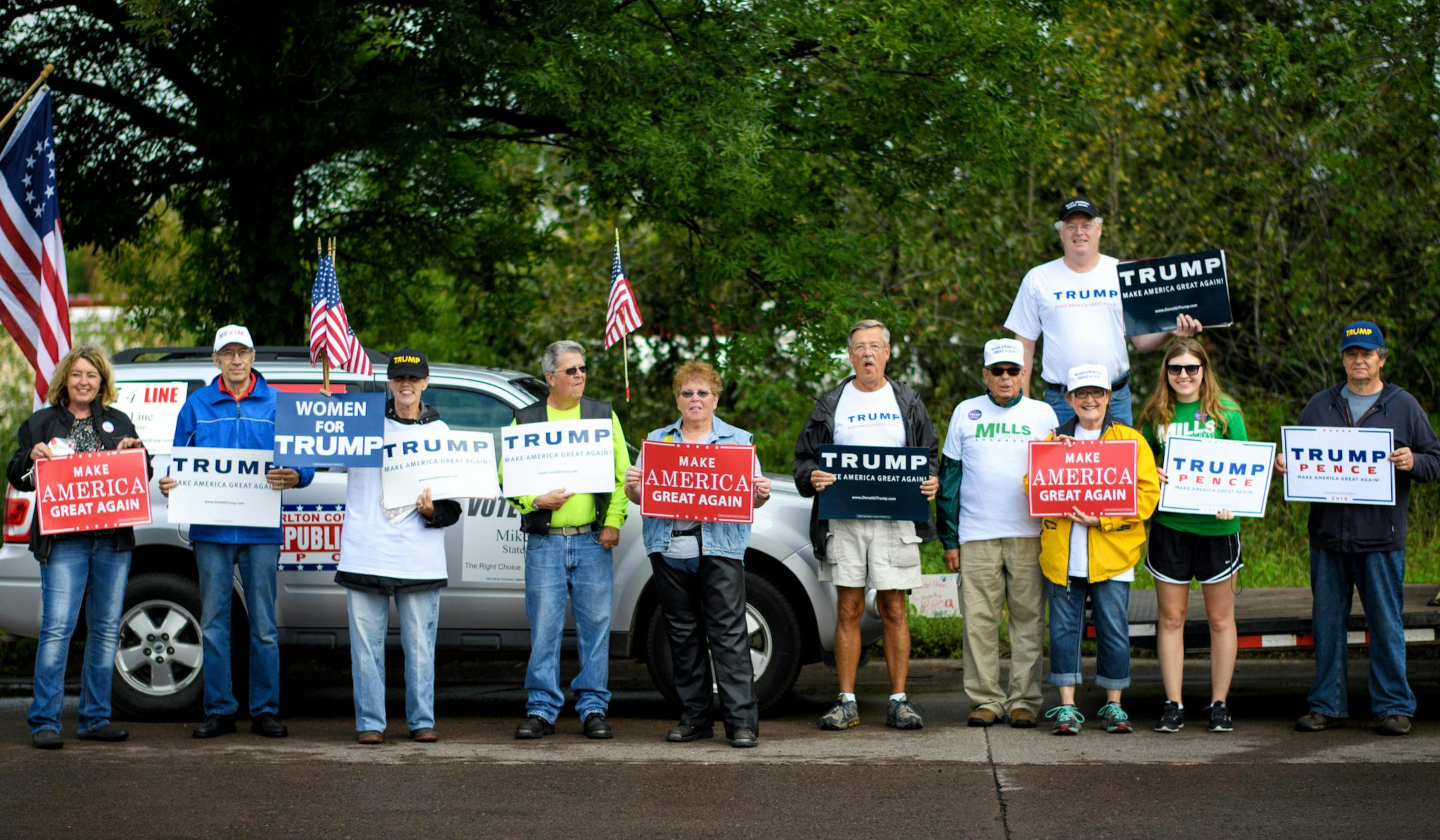Carleton County Republican donald Trump supporters posed for a group photo just before the start of the Cloquet Labor Day parade. ] GLEN STUBBE * gstubbe@startribune.com Monday, September 5, 2016 Hillary Clinton has a formidable team on the Iron Range to identify supporters and make sure they vote in November. While Donald Trump has relied on high-profile events, Clinton's widening organizational effort on the Iron Range mirrors the get-out-the-vote effort that will be critical in battleground s