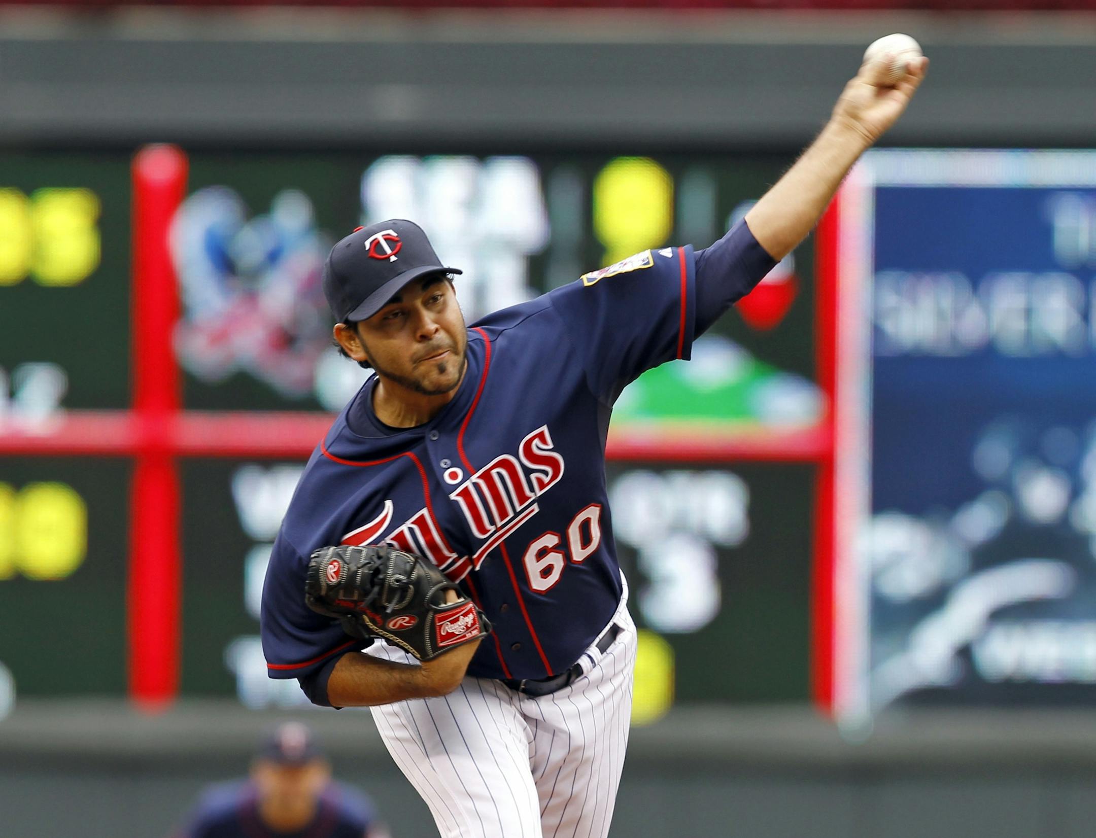 Minnesota Twins starting pitcher Pedro Hernandez (60) delivers to the Tampa Bay Rays during the third inning of a baseball game, Sunday, Sept. 15, 2013, in Minneapolis.