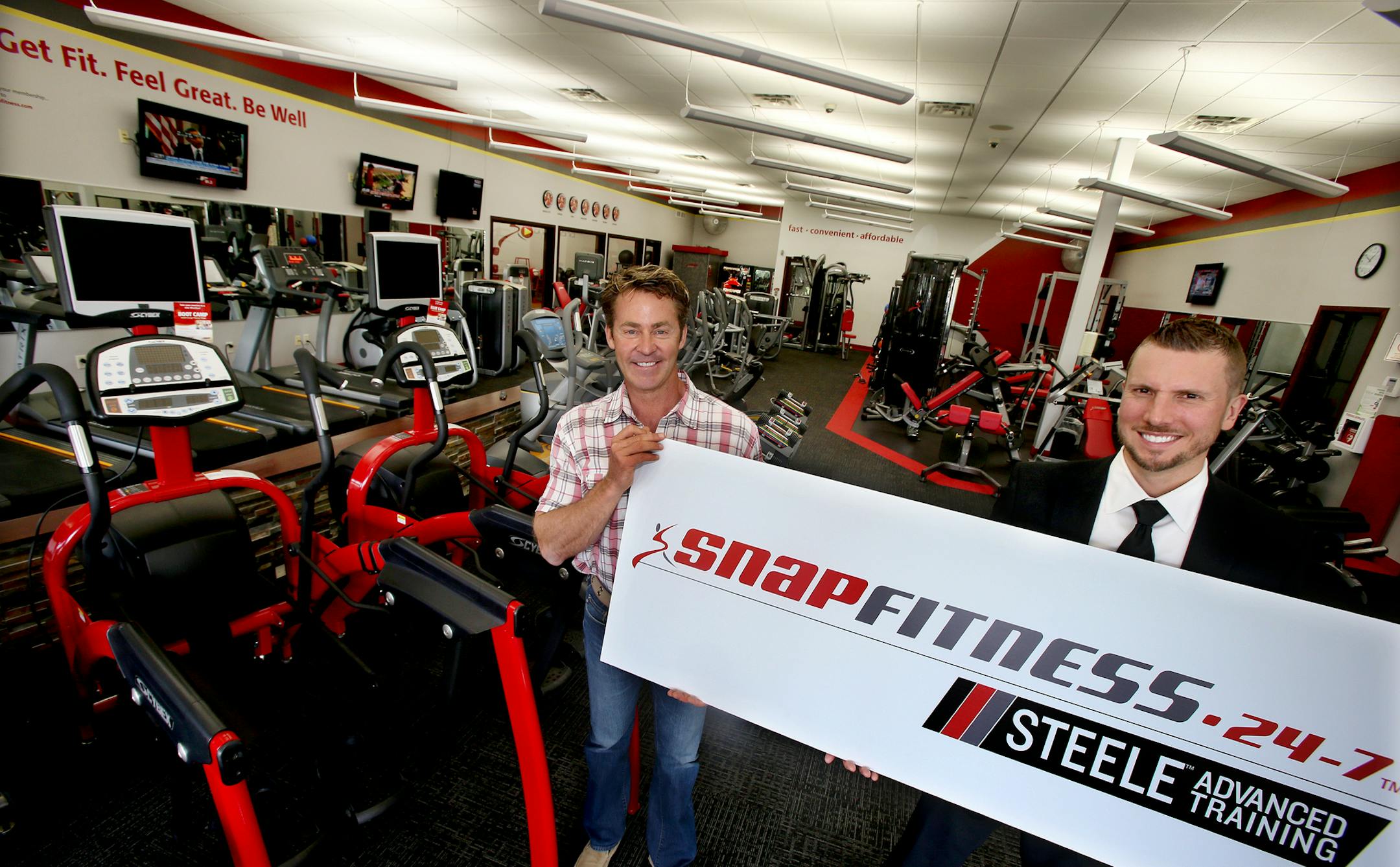 President, CEO Peter Taunton of Snap Fitness (left) and Creative Director, Steele Smilley of Steele Training at Snap Fitness World Headquarters in Chanhassen, MN on September 03, 2013. ] JOELKOYAMA‚Ä¢joel koyama@startribune