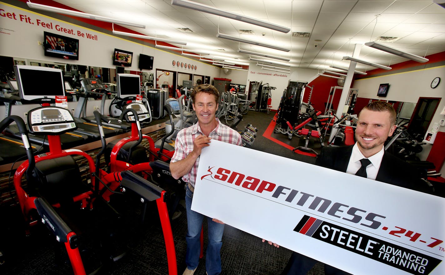 President, CEO Peter Taunton of Snap Fitness (left) and Creative Director, Steele Smilley of Steele Training at Snap Fitness World Headquarters in Chanhassen, MN on September 03, 2013. ] JOELKOYAMA&#x201a;&#xc4;&#xa2;joel koyama@startribune