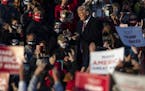 President Trump walked on a catwalk to his podium as thousands of supporters cheered and chanted. ] ALEX KORMANN • alex.kormann@startribune.com Pres