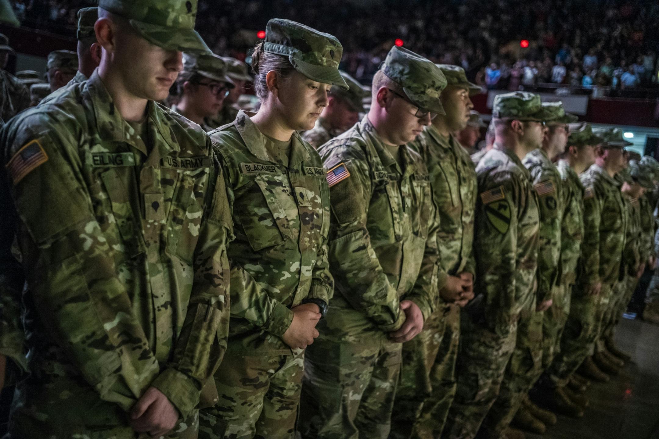 About 650 soldiers in the 34th Red Bull Infantry Dvision, based in Rosemount, including Bethany Blackmer, second from left, attended a departure ceremony for a nine-month deployment in Kuwait.