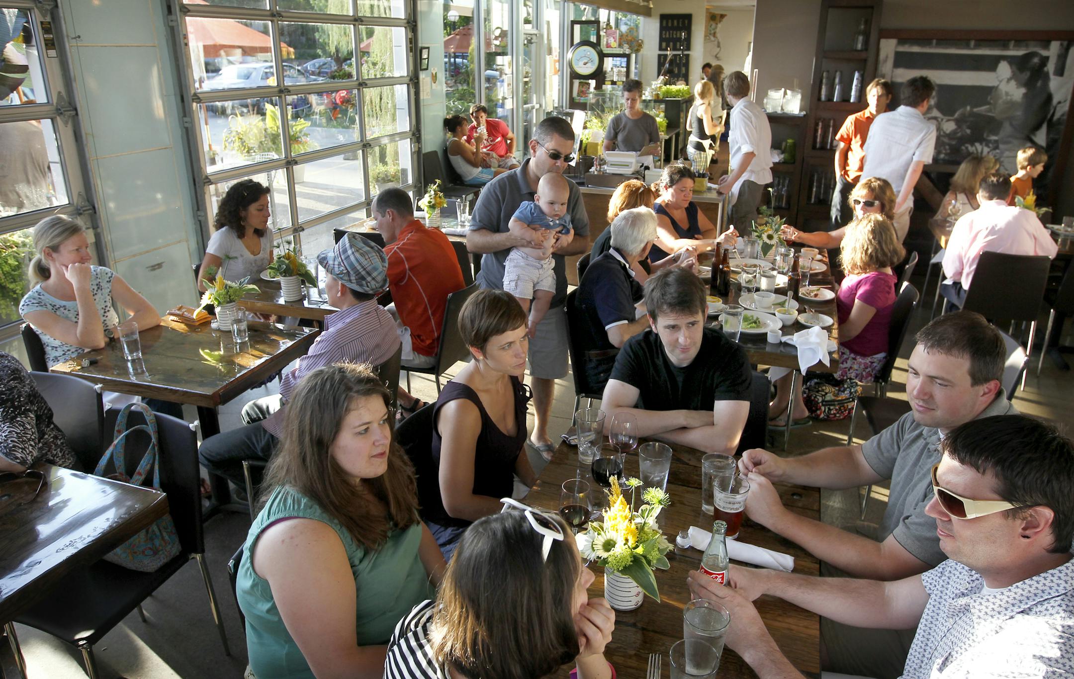 A full dining room at the Wise Acre Eatery, 5401 Nicollet Ave South, Mpls, MN] TOM WALLACE ‚Ä¢ twallace@startribune.com __Assignments #20018935A_ July 14, 2011_ SLUG: rn0728_ EXTRA INFORMATION: The Wise Acre Eatery restaurant, 5401 Nicollet Ave South, Mpls, MN, has been open for a couple months. People: A portrait of Chef, (CQ) Beth Fisher, and a portrait of Fisher and GM (CQ)Caroline Glawe. Food: Fried chicken, "Shades of Summer" salad, and the custard sundae of the day. _Names