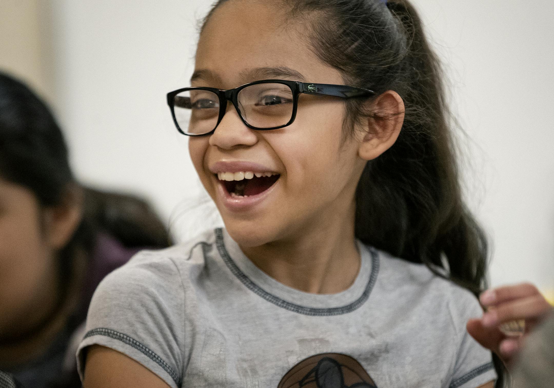 Danha Silva, 11, delights in facial formations.