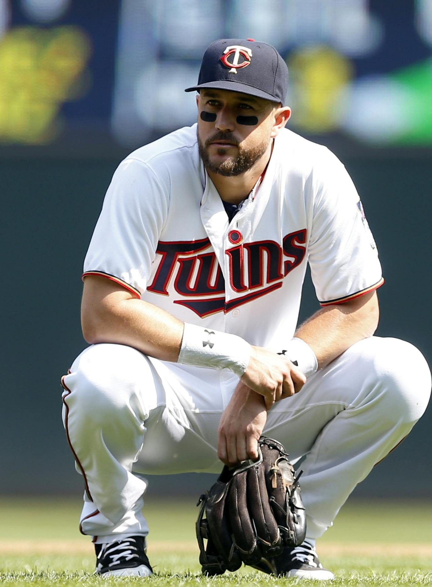 Minnesota Twins&#xed; Trevor Plouffe takes a break during a play review in a baseball game against the Chicago White Sox Thursday, April 14, 2016, in Minneapolis. (AP Photo/Jim Mone) ORG XMIT: MNJM10