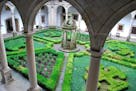 One of four beautiful arcaded cloisters inside the Parador de Santiago de Compostela, the San Mateo cloister has two crosses representing the Royal Ho