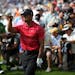 Tiger Woods showed his disappointment with a shot during the fintsal round of the 2009 PGA Championship at Hazeltine National. Y.E. Yang outdueled Woo