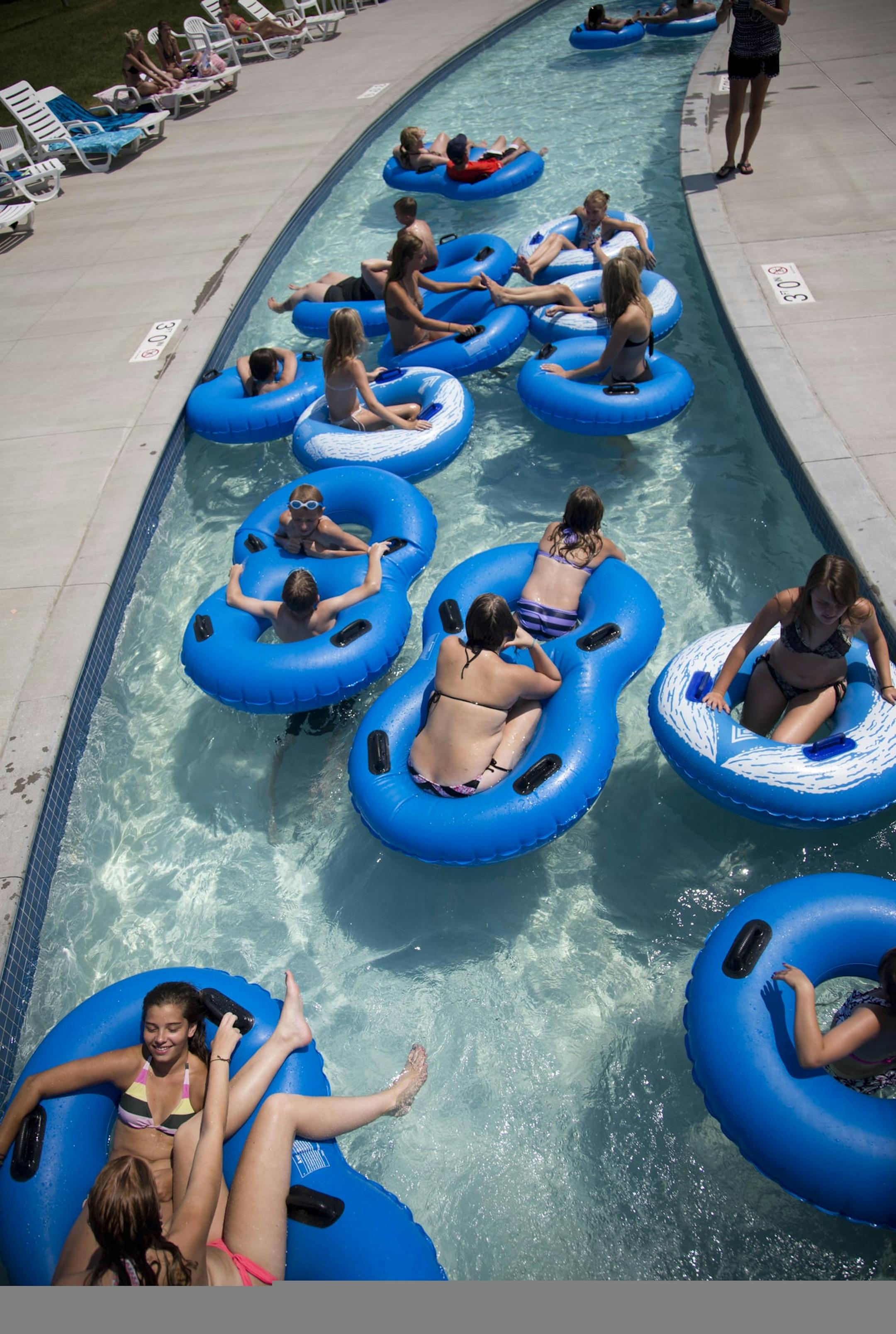 A crowd floated down the lazy river at Bunker Beach in Andover, Minn. on Thursday, July 5, 2012. ] (RENEE JONES SCHNEIDER ‚Ä¢ reneejones@startribune.com) ORG XMIT: MIN2013080915263830