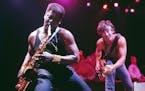 Bruce Springsteen, right, watched Clarence Clemons play the saxophone during a December 12, 1984 concert before 23,000 fans in Rupp Arena in Lexington
