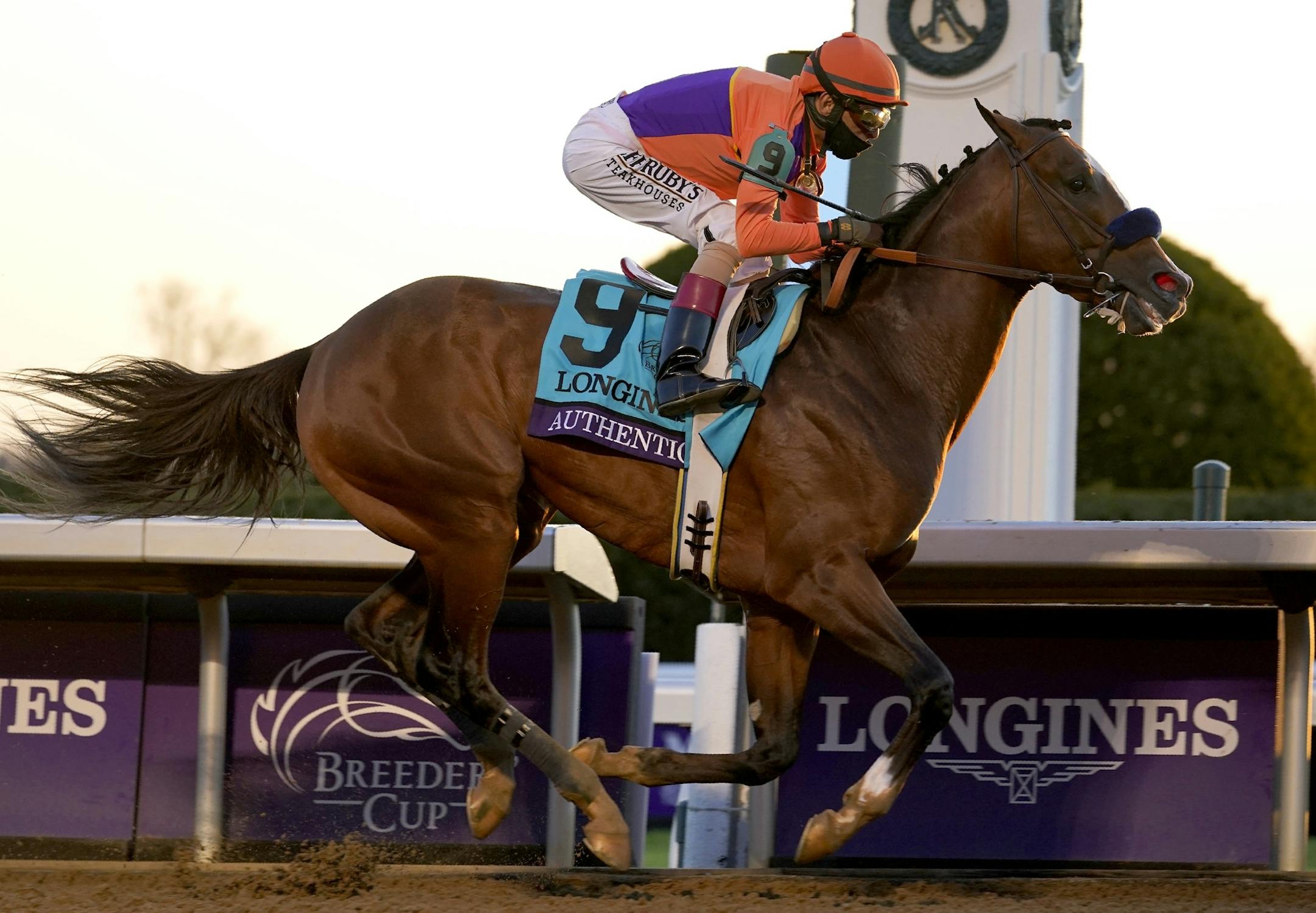 John Velazquez (9) rides Authentic to win the Breeder's Cup Classic horse race at Keeneland Race Course, in Lexington, Ky., Saturday, Nov. 7, 2020. (AP Photo/Michael Conroy)