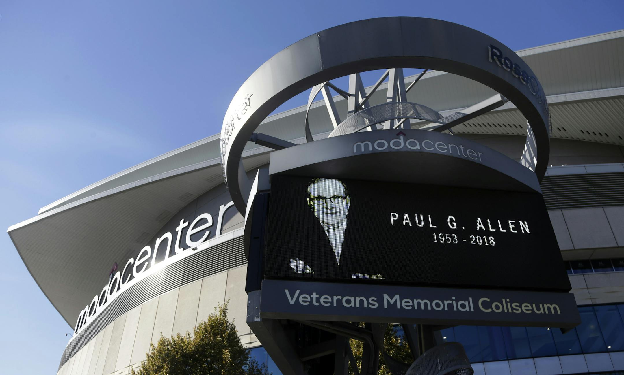 Portland Trail Blazers owner Paul Allen is memorialized on a marquee in front of the Moda Center, where the team plays, in Portland, Ore., Tuesday, Oct. 16, 2018. Allen, who co-founded Microsoft with his childhood friend Bill Gates before becoming a billionaire philanthropist, technology investor and owner of several professional sports teams, died in Seattle Monday, Oct. 15, 2018, at the age of 65. (AP Photo/Don Ryan)