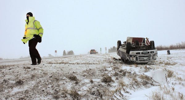A rollover crash on Interstate 90 east of Austin, Minn., Dec. 20, 2012.