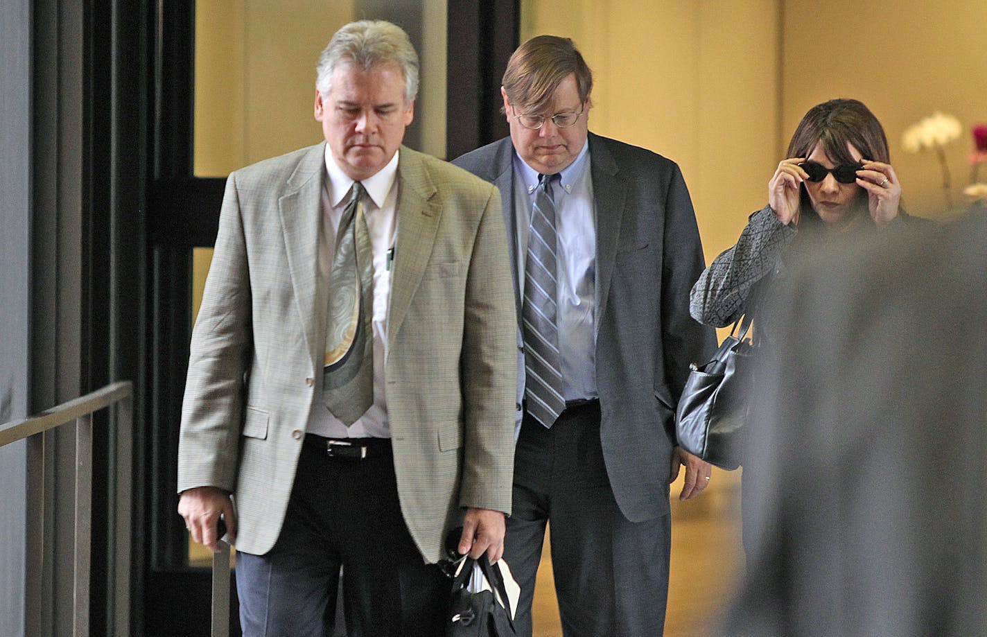 Frank Vennes, left, made his way out of the Federal Courthouse in St. Paul, MN, Wednesday, June 5, 2013. (ELIZABETH FLORES/STAR TRIBUNE) ELIZABETH FLORES &#x2022; eflores@startribune.com