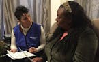 Dr. Kathy Tossas-Milligan (left), an epidemiologist with the University of Illinois? at Chicago, interviews Yolanda Flowers as part of a pilot project