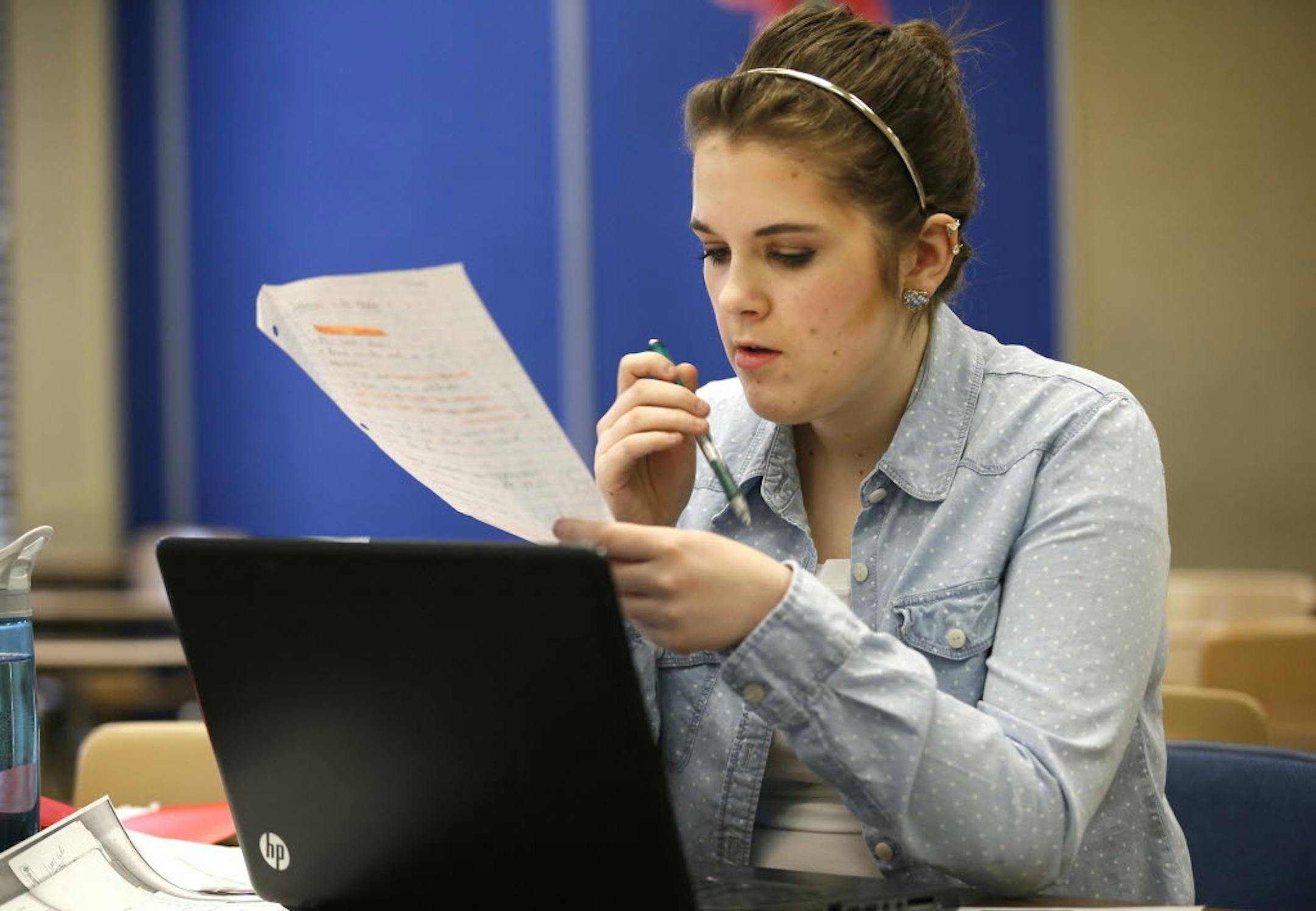 May 8, 2014: Lauren Hince a student at Blaine High School works on a story during her journalism class.