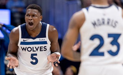 Wolves guard Anthony Edwards reacts after being called for a technical foul on Saturday in Denver.