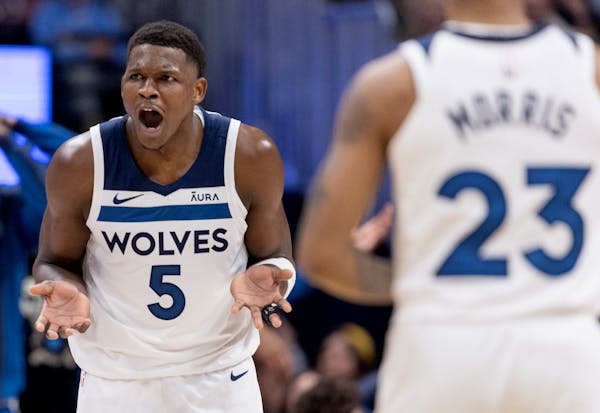 Wolves guard Anthony Edwards reacts after being called for a technical foul on Saturday in Denver.
