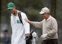 FILE - In this April 9, 2005, file photo, Jack Nicklaus, right, walks with his son and caddie, Jack Nicklaus II