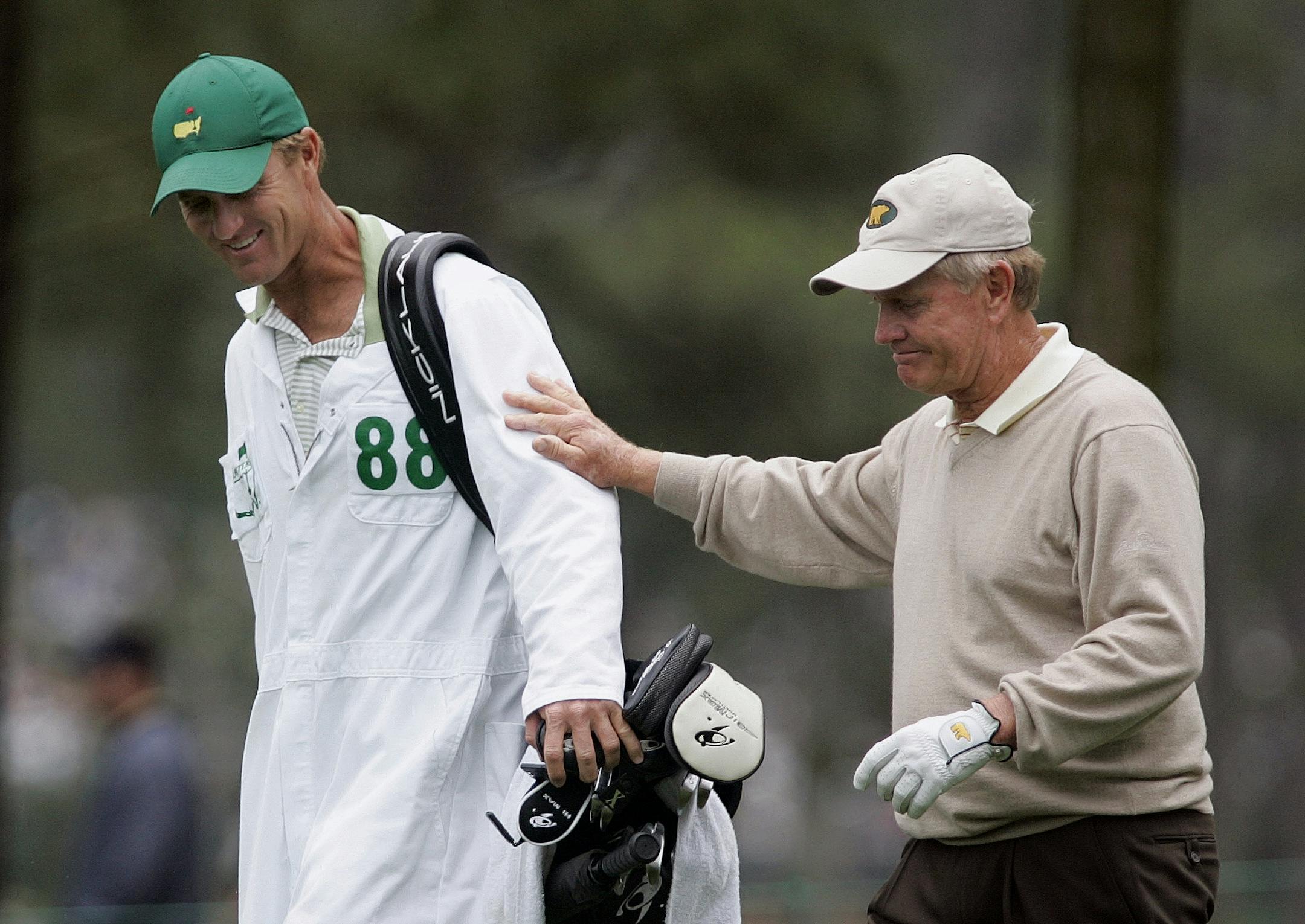 FILE - In this April 9, 2005, file photo, Jack Nicklaus, right, walks with his son and caddie, Jack Nicklaus II