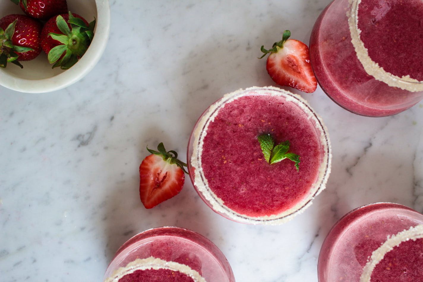 Fresh berries make sweet summer cocktails using your liquor of choice — or a refreshing N/A version. Recipe by Beth Dooley, photo by Ashley Moyna Schwickert