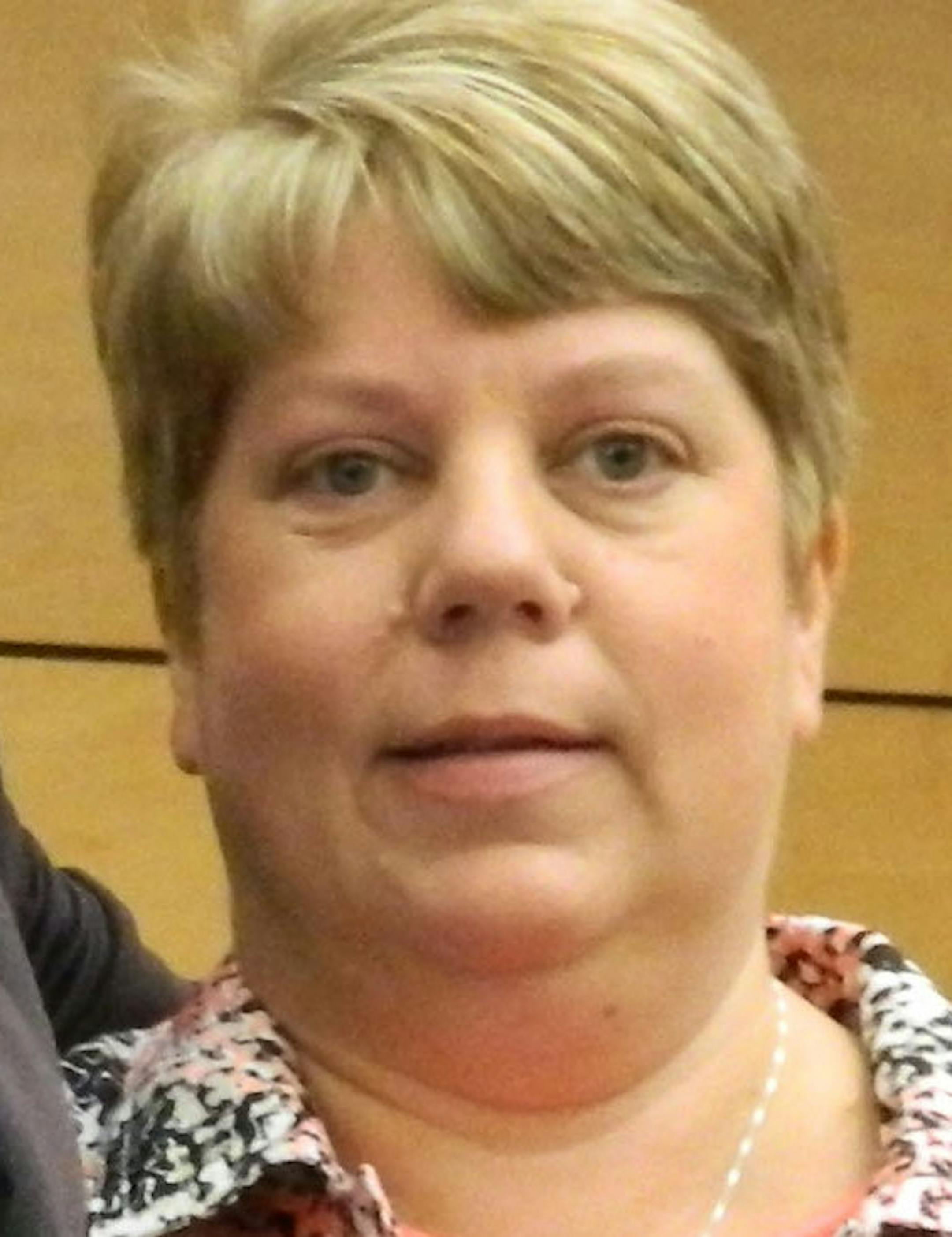 Commissioner Gary Kriesel with Trudee Watson, winner of the Outstanding Volunteer award.