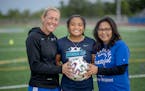 St. Michael-Albertville girls’ soccer coach Megan Johnson, left, Juliana Zerna, center, and her mother, Cleofa Zerna, right.