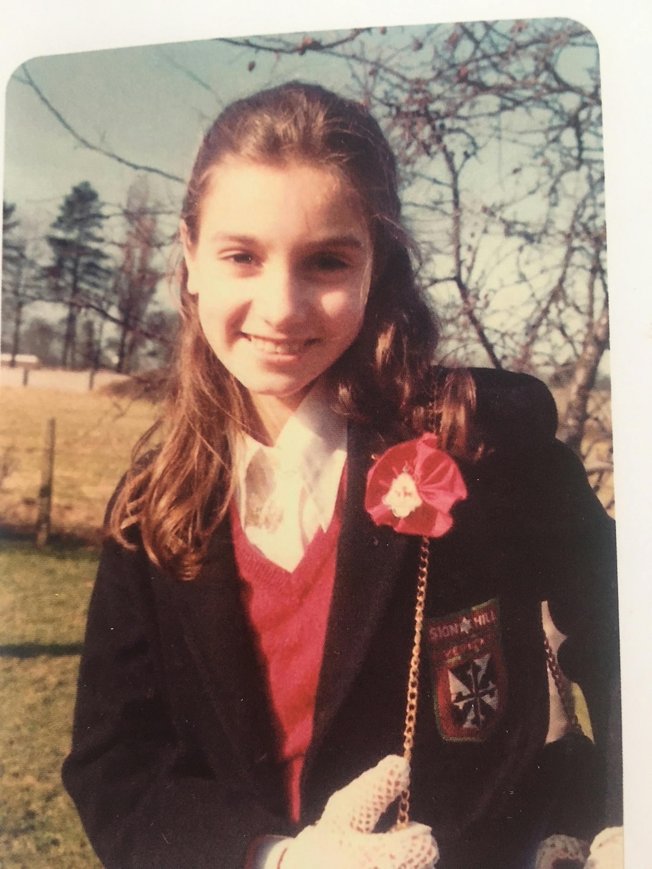 A photo provided by Sinead O'Connor shows her at age 12 on the day of her confirmation. O'Connor's memoir, "Rememberings," recasts the story of her career from her perspective. (Sinead O'Connor via The New York Times) — NO SALES; FOR EDITORIAL USE ONLY WITH NYT STORY SLUGGED OCONNOR MEMOIR ADV23 BY AMANDA HESS FOR MAY 19, 2021. ALL OTHER USE PROHIBITED. —