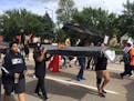 Philando Castile protesters neared the State Fair's main entrance Saturday afternoon.