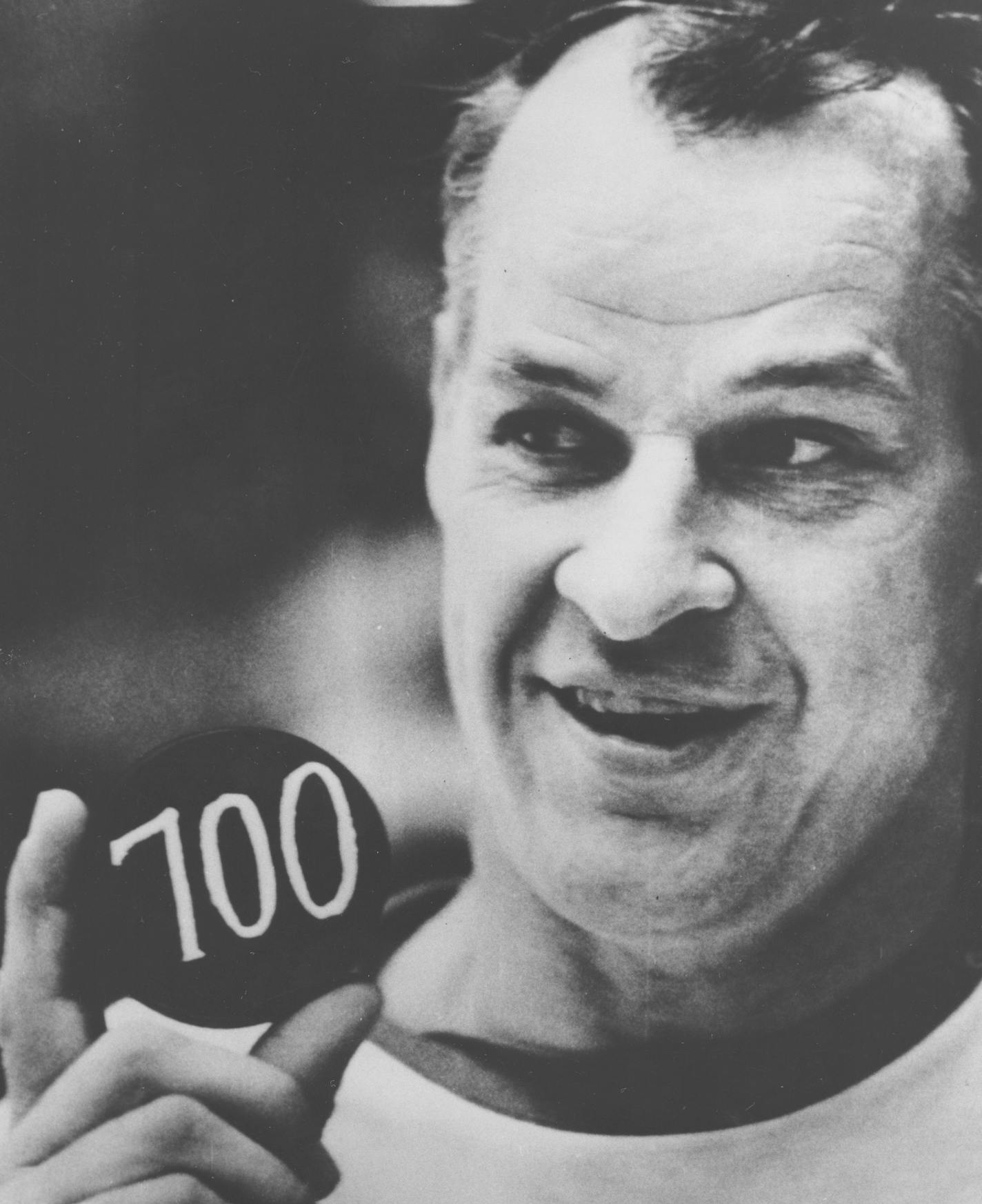 FILE - In this Dec. 5, 1968, file photo, Detroit Red Wings hockey player Gordie Howe displays a hockey puck with the number 700 on it signifying the scoring of his 700th career goal, in Pittsburgh, Pa. Howe, the rough-and-tumble Canadian farm boy whose boundless blend of talent and toughness made him the NHL&#x2019;s quintessential star during a career that lasted into his 50s, died Friday. The man forever known as &#x201c;Mr. Hockey&#x201d; was 88. (AP Photo/File)