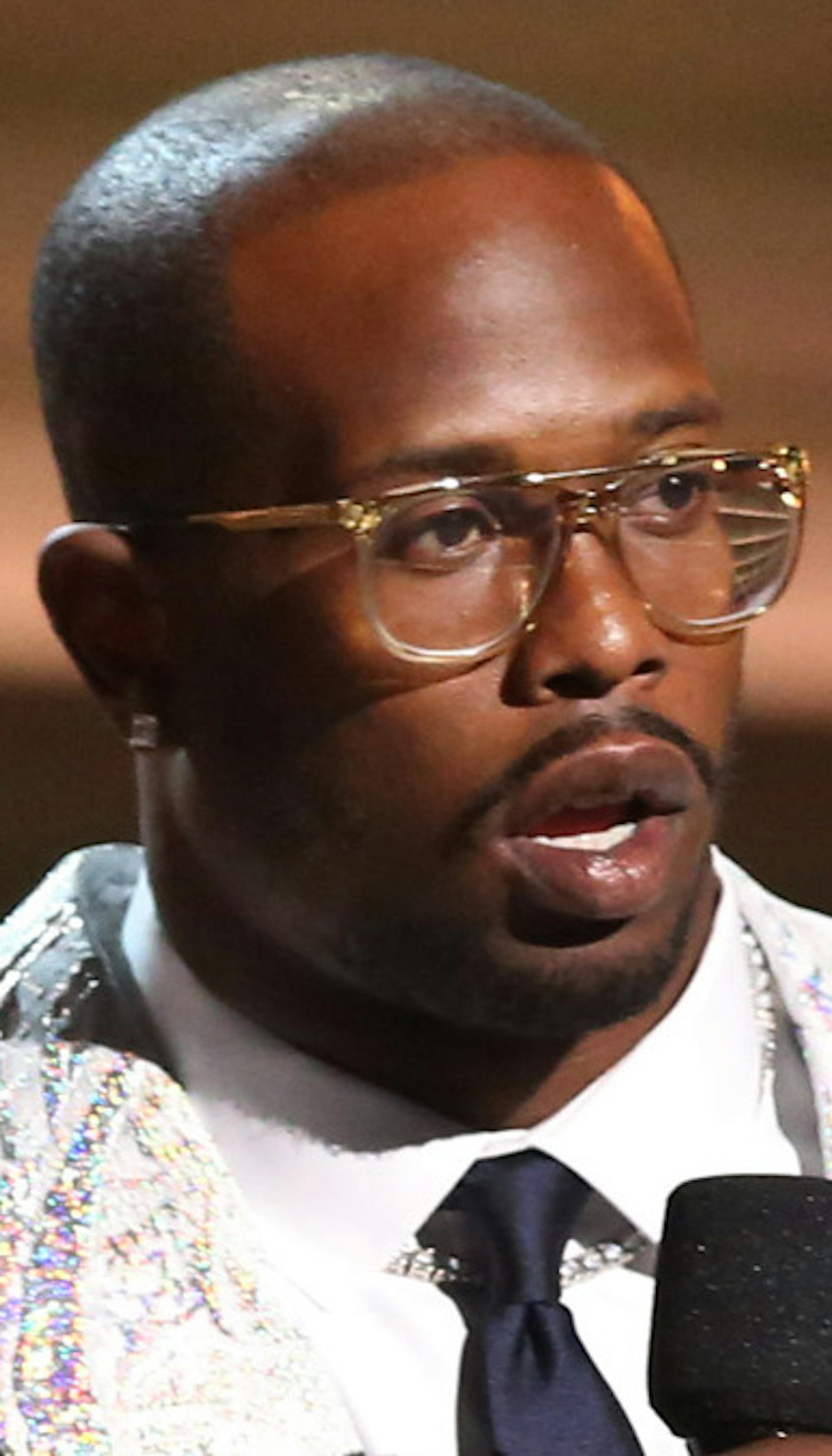 San Francisco 49ers' Anquan Boldin, left, and Denver Broncos' Von Miller introduce a performance at the 58th annual Grammy Awards on Monday, Feb. 15, 2016, in Los Angeles. (Photo by Matt Sayles/Invision/AP)