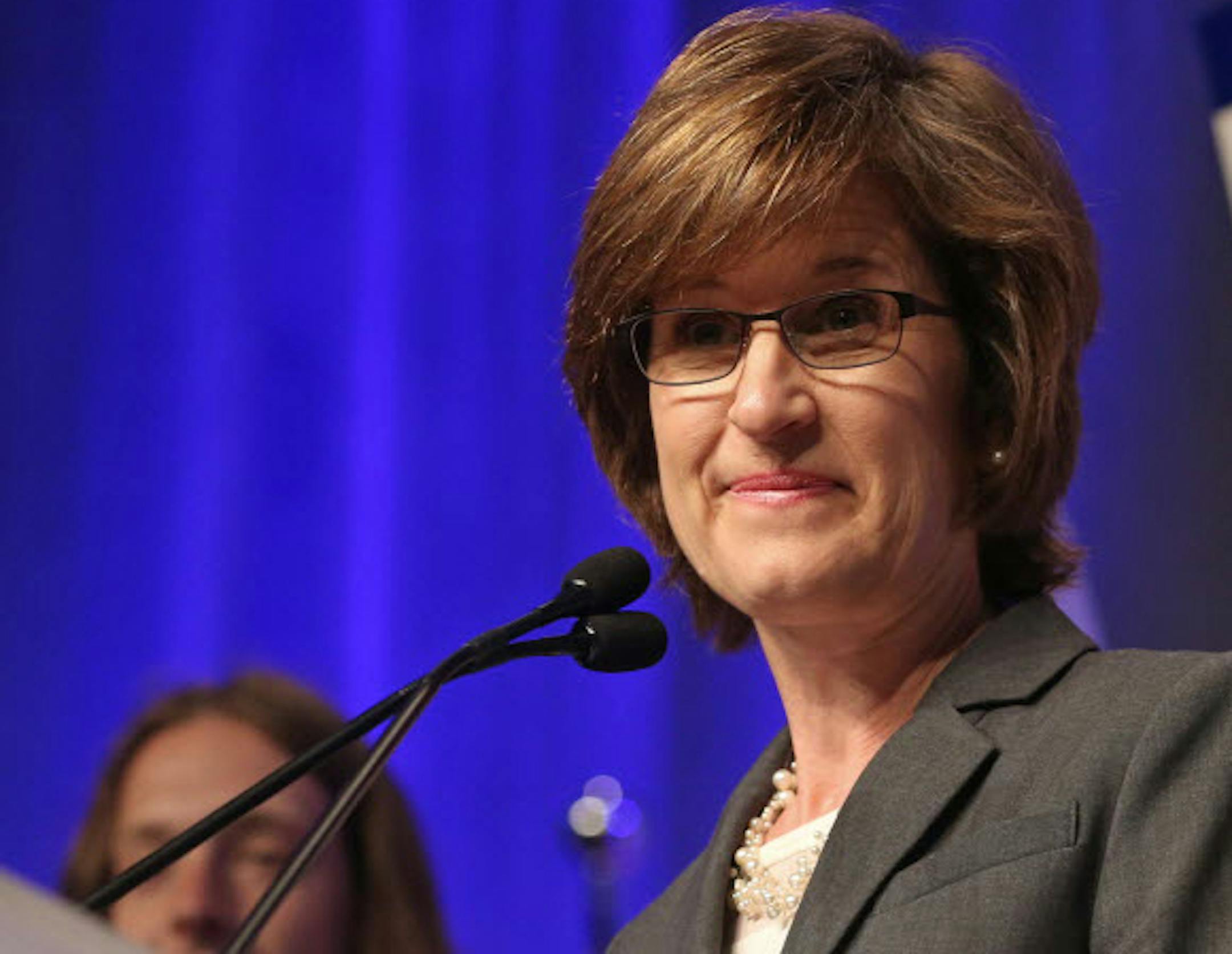 State Auditor Rebecca Otto addresses the Minnesota Democratic-Farmer-Labor Party Convention, Saturday, May 31, 2014 in Duluth, Minn.
