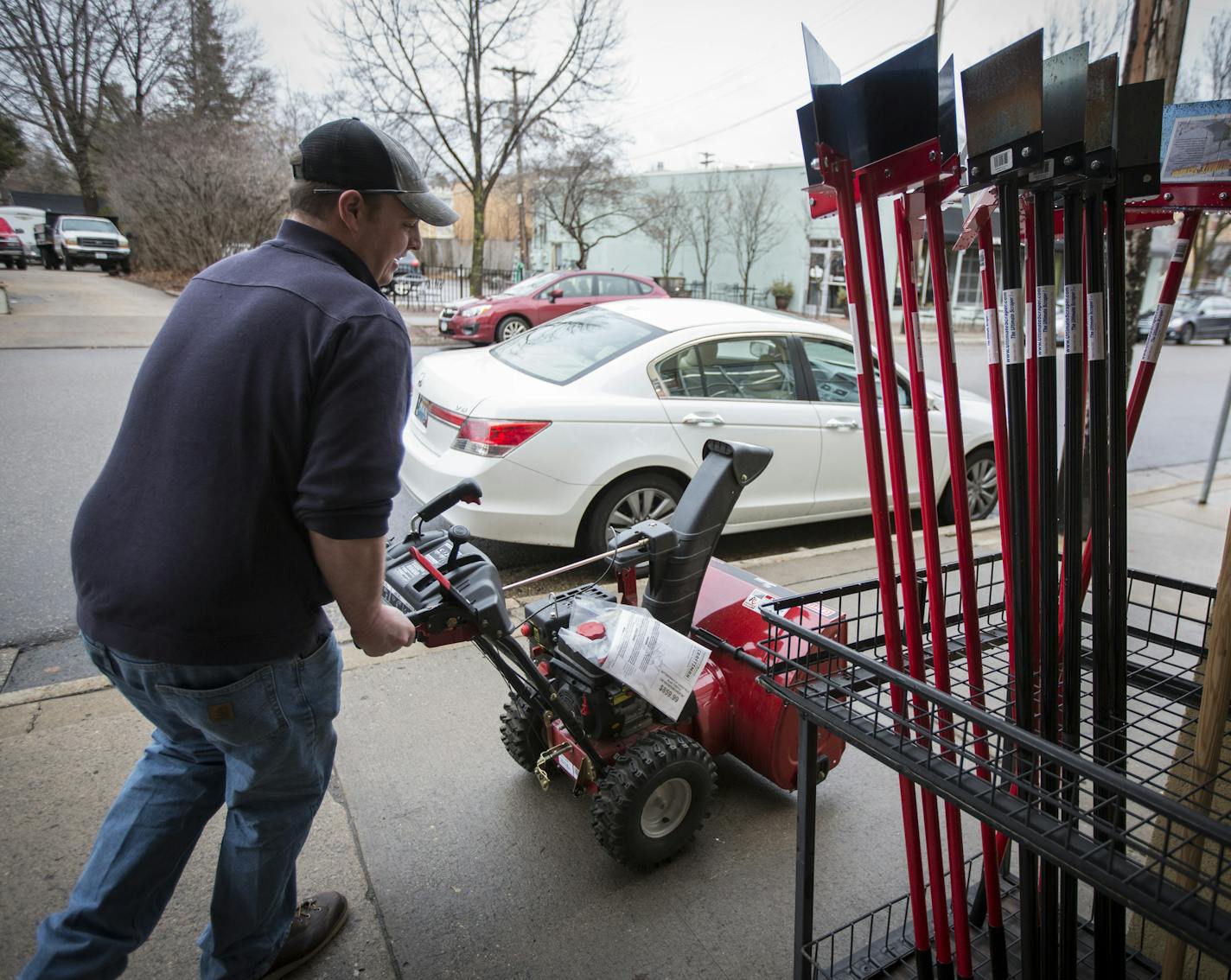 Manager Joe Young moved the blowers out to the front of at Settergren Hardware after the rain stopped on Monday, December 14, 2015, in Minneapolis, Minn. ] RENEE JONES SCHNEIDER &#x2022; reneejones@startribune.com