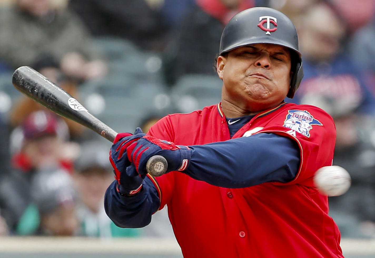 Minnesota Twins' Willians Astudillo gets hit by a pitch by Cleveland Indians' Shane Bieber in the eighth inning of a baseball game Sunday, March 31, 2019, in Minneapolis. The Twins won 9-3. (AP Photo/Bruce Kluckhohn)