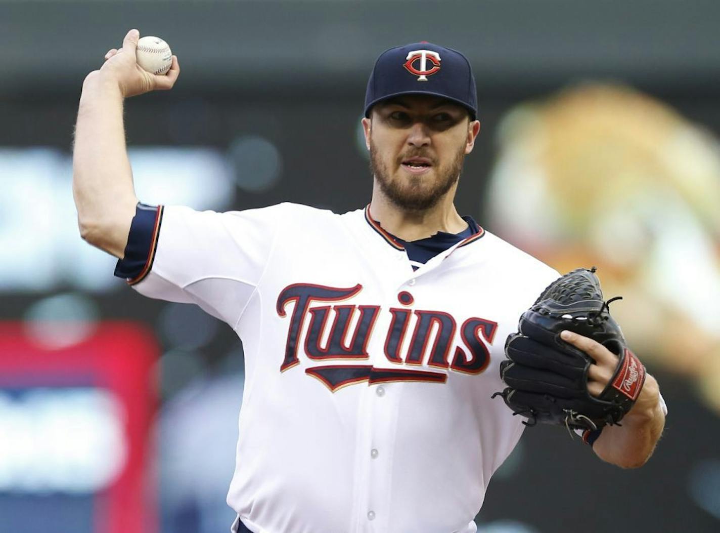 Minnesota Twins pitcher Phil Hughes throws against the Oakland Athletics in the first inning of a baseball game Monday, May 4, 2015, in Minneapolis.