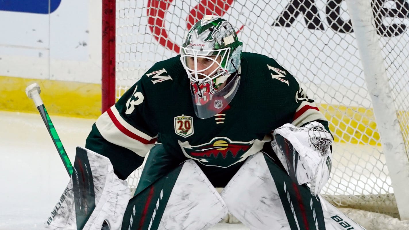 Minnesota Wild goalie Cam Talbot (33) warms up before playing against the San Jose Sharks in an NHL hockey game, Friday, Jan. 22, 2021, in St. Paul, Minn. (AP Photo/Jim Mone)