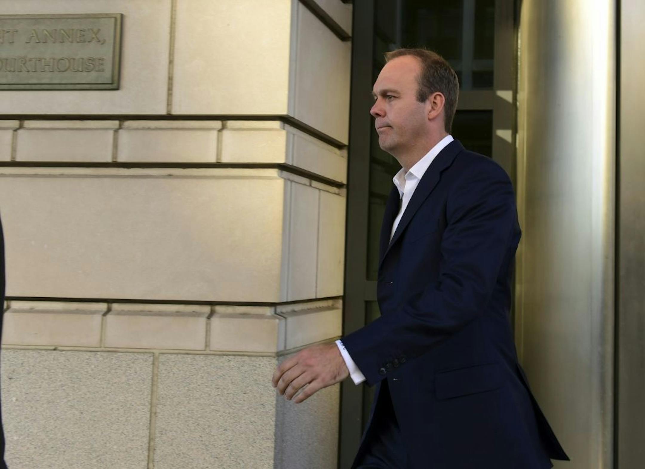 Rick Gates leaves federal court in Washington, Monday, Oct. 30, 2017. Paul Manafort, President Donald Trump's former campaign chairman, and Manafort's business associate Gates pleaded not guilty to felony charges of conspiracy against the United States and other counts.
