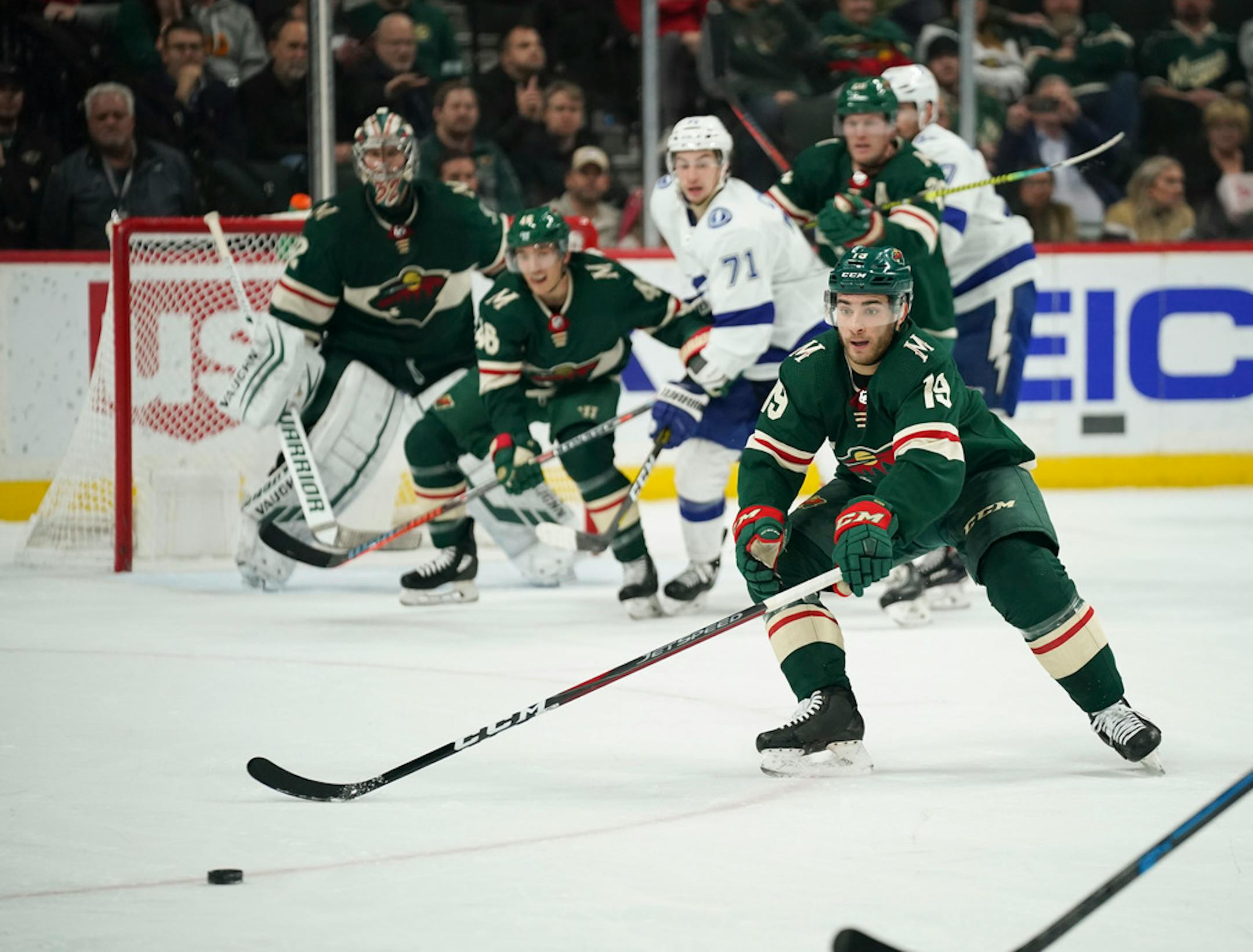 Minnesota Wild center Luke Kunin (19) tried to block a shot by Tampa Bay Lightning defenseman Victor Hedman (77) in the third period Thursday.